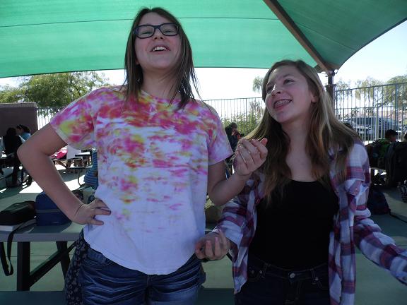 Seventh graders Olivia Moran and Reece Stover joke with each other after the end of the season.  Volleyball has strengthened their bond, and the pair remain fast friends.