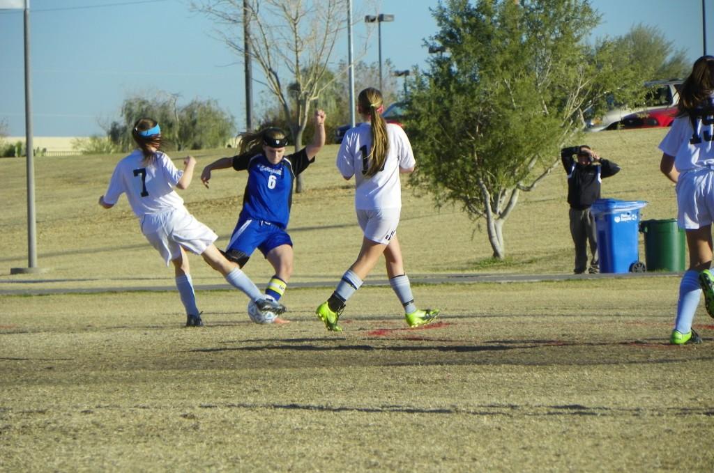 Senior Zoe Lockwood battles for possession of the ball. Horizon Honors lost the game against Valley Christian with a final score of 2-3.