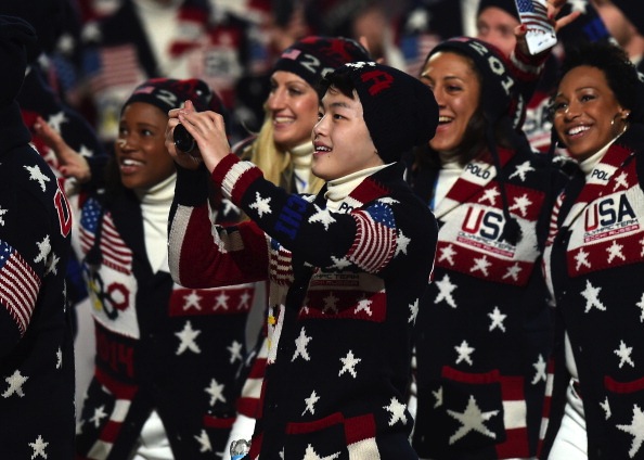 Figure skater Alex Shibutani joins the USA team for Sochi’s Opening Ceremonies. Shibutani and his sister Maia skated for the United States figure skating team together.