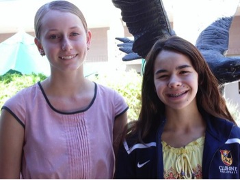 On right, NJHS president Maggie Kenzler and Emily LaBatt, NJHS member, stand side by side for their picture.  These students are among such that enjoy ways to give back to their community.