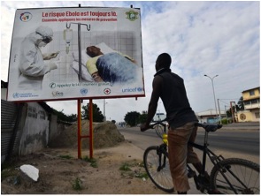 Things haven’t taken a turn for the better yet in the regions flanked by Ebola, but the amount of hyper-awareness has skyrocketed. Here, a man in the Ivory Coast reads a PSA cautioning citizens of the virus; his homeland shares a border with two of the infected nations.