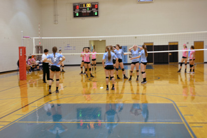 The opposing team Yuma Catholic (in pink) and Horizon Eagles in blue 
set up for the last home game. The final set ended  25-23, way to go Eagles!
