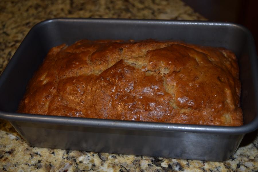 Warm, baked banana bread fresh out of the oven.