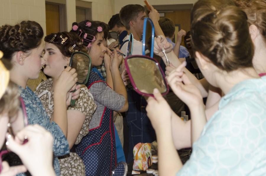 Cast and crew of The Pajama Game get ready for one of their final dress rehearsals.