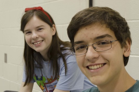 Tech crew members Claire Bennett and Connor Lowe get set up for "The Pajama Game."