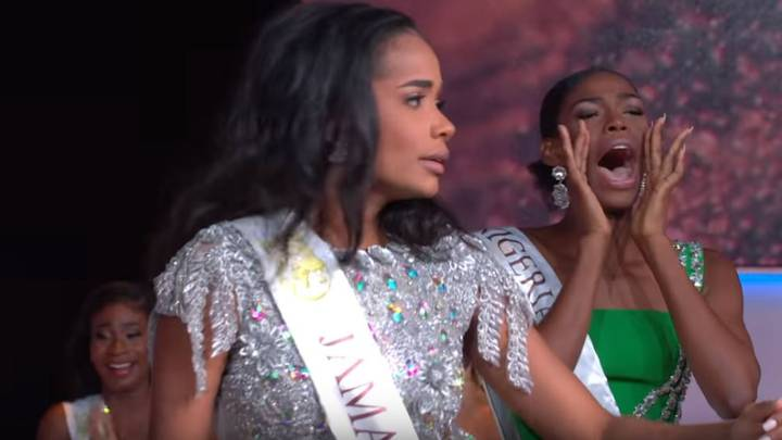 Miss Nigeria cheering on her friend.