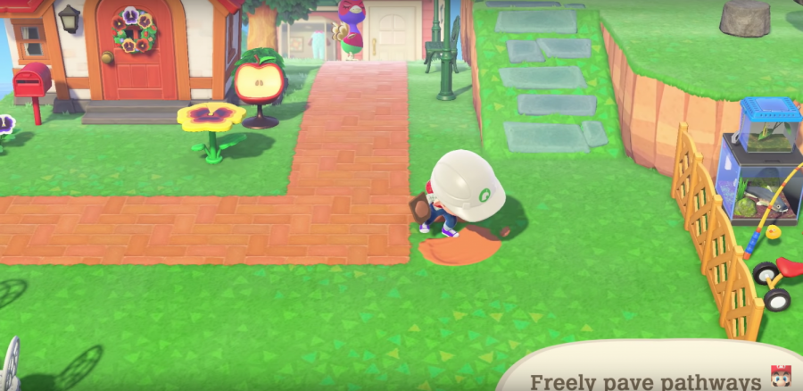 A screenshot from the Animal Crossing: New Horizons Direct of a player placing down a path.