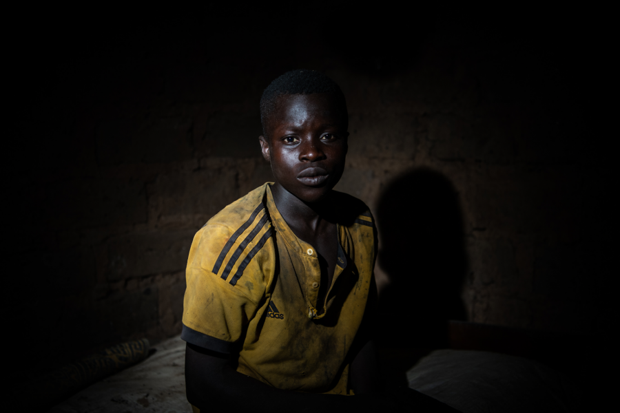 Karim Bakaray, 16, works at a cocoa farm.