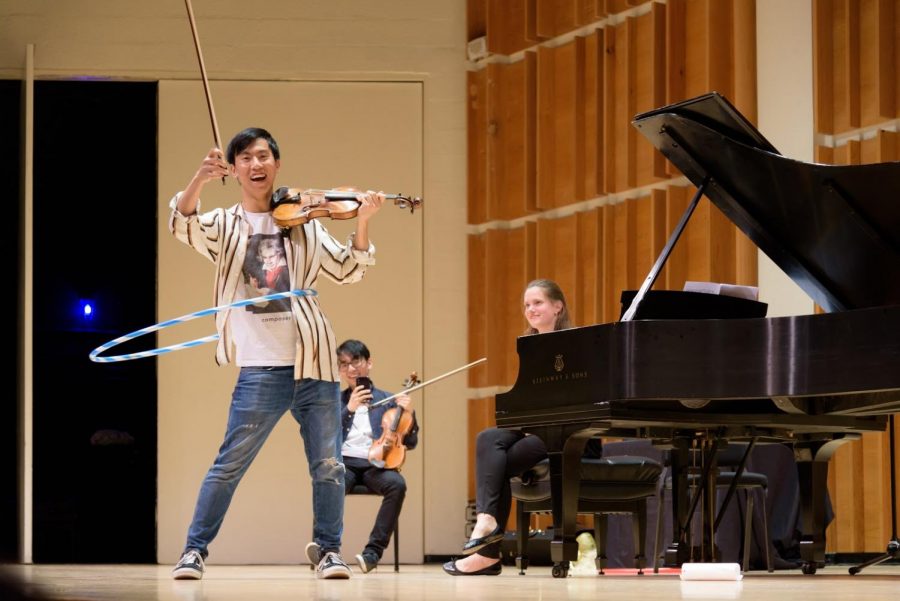 Eddy Chen performing Paganini Caprice No. 24 while hula hooping.