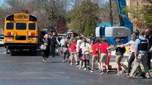 Students evacuating Covenant School just after the shooting.
