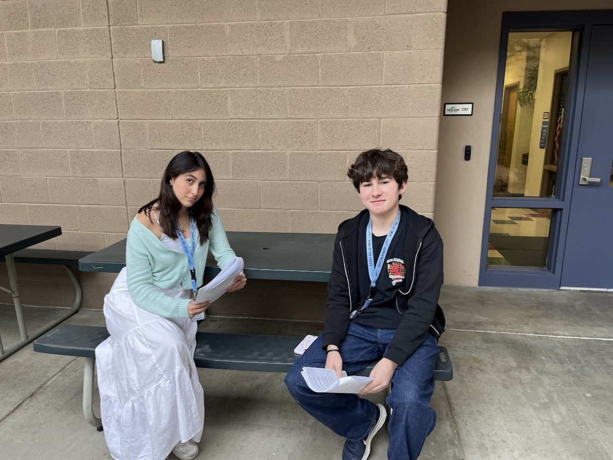 Domenica Alberca Escobar (left) and Colton Johnston (right) wait to audition for Beauty and the Beast.