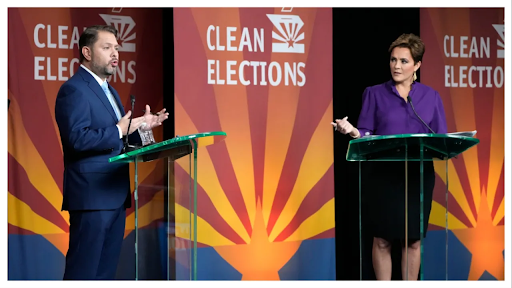 Ruben Gallego and Kari Lake at the debate. 