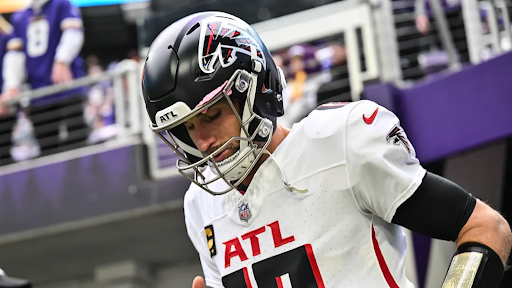 Kirk Cousins enters the field prior to a game against the Minnesota Vikings.