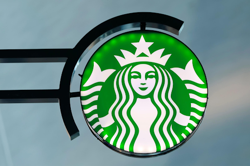 Starbucks logo outside of a shop/