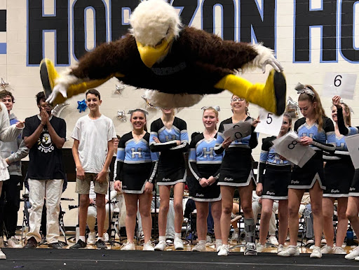 Blaze the eagle performing tricks at the pep rally. 