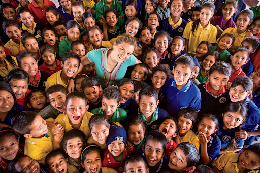 Maggie Doyne with Nepal children.