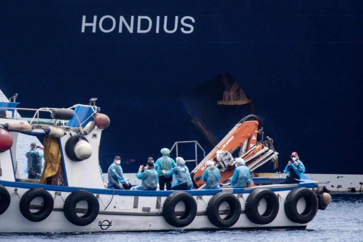 Image of passengers being escorted off of cruise.